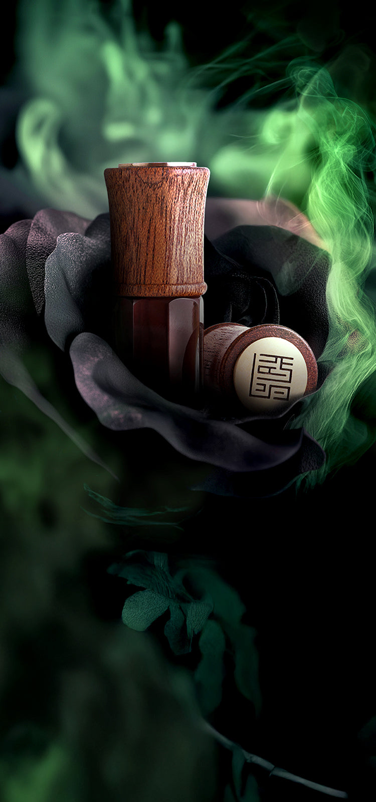 Luxury Arabic perfume bottle with wooden cap nestled in a black rose, surrounded by green smoke – SULAYM artisanal fragrance branding.